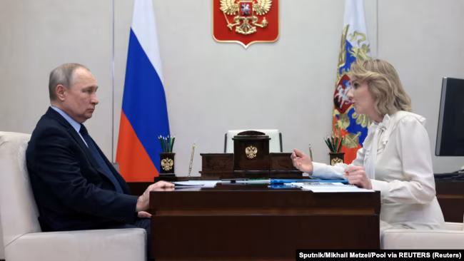 Очільник РФ Володимир Путін і уповноважена при президенті Росії з прав дитини Марія Львова-Бєлова